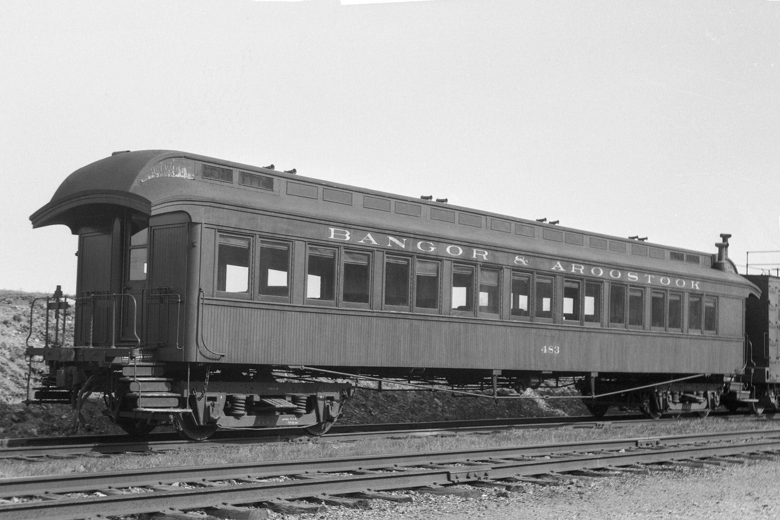 Bangor & Aroostook wooden coach #483 at Oakfield, Maine on May 15, 1951. Bangor & Aroostook wooden coach #483 at Oakfield, Maine on May 15, 1951.