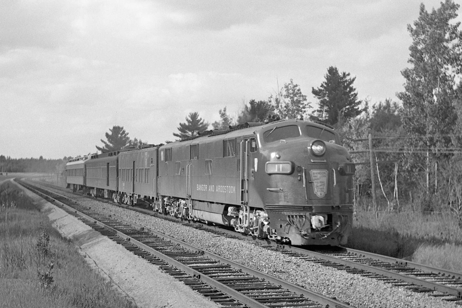 Bangor & Aroostook E7A #11 with a directors special southbound just north of Bangor, Maine on September 2, 1965. Bangor & Aroostook E7A #11 with a directors special southbound just north of Bangor, Maine on September 2, 1965.
