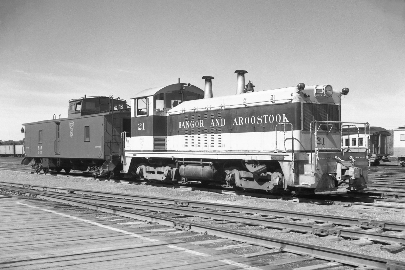 BAR NW2 #21 with caboose #C65 @ Houlton, ME on 7/3/1957 BAR NW2 #21 with caboose #C65 @ Houlton, ME on 7/3/1957