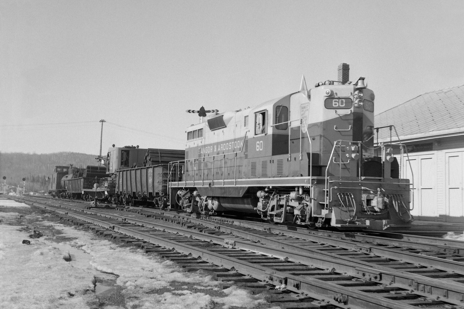 BAR GP7 #60 with a work train at Millinocket, ME on 3/31/1959. BAR GP7 #60 with a work train at Millinocket, ME on 3/31/1959.