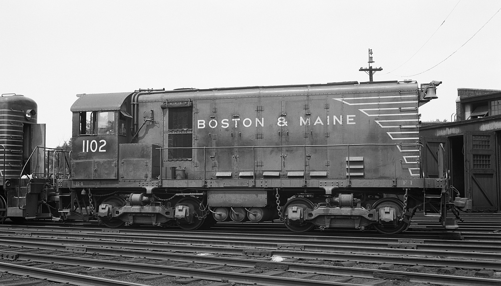 Boston & Maine Alco HH600 #1102 at Lawrence, MA on 7/6/1947. (8x14)