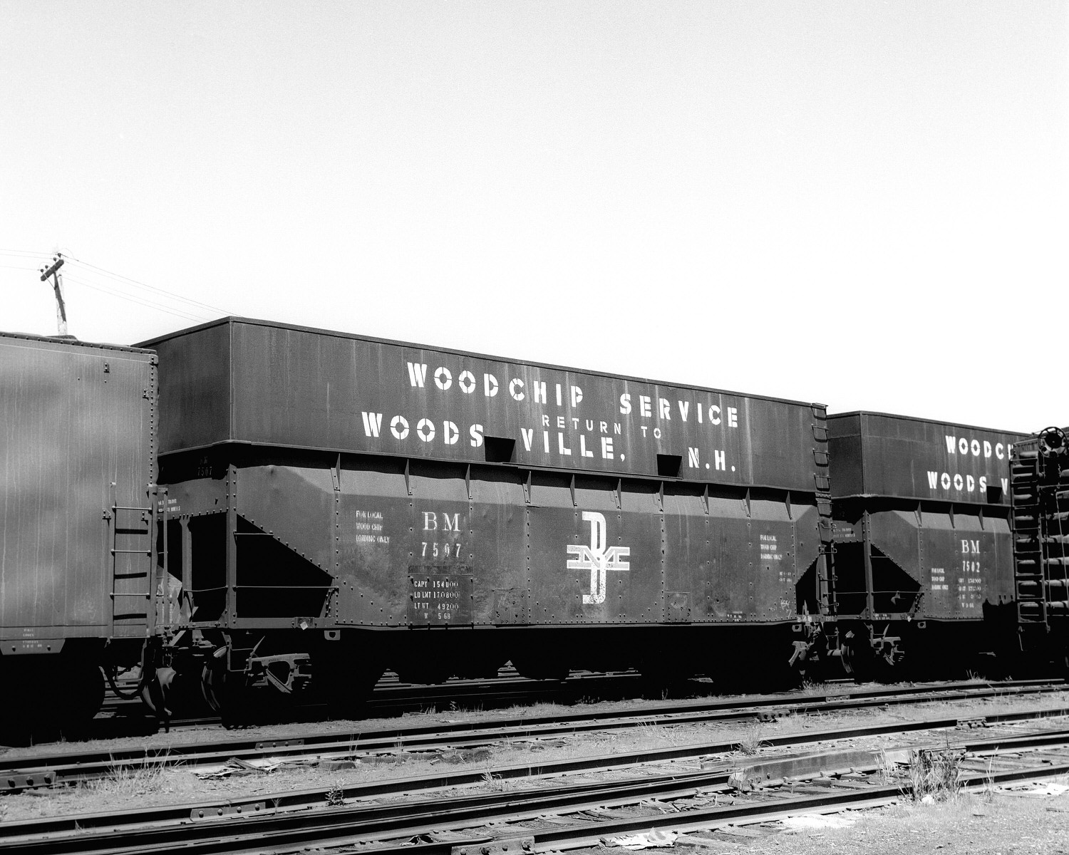 B&M Woodchip Car #7507 at Berlin, NH on July 2, 1969. (8x10) B&M Woodchip Car #7507 at Berlin, NH on July 2, 1969. (8x10)