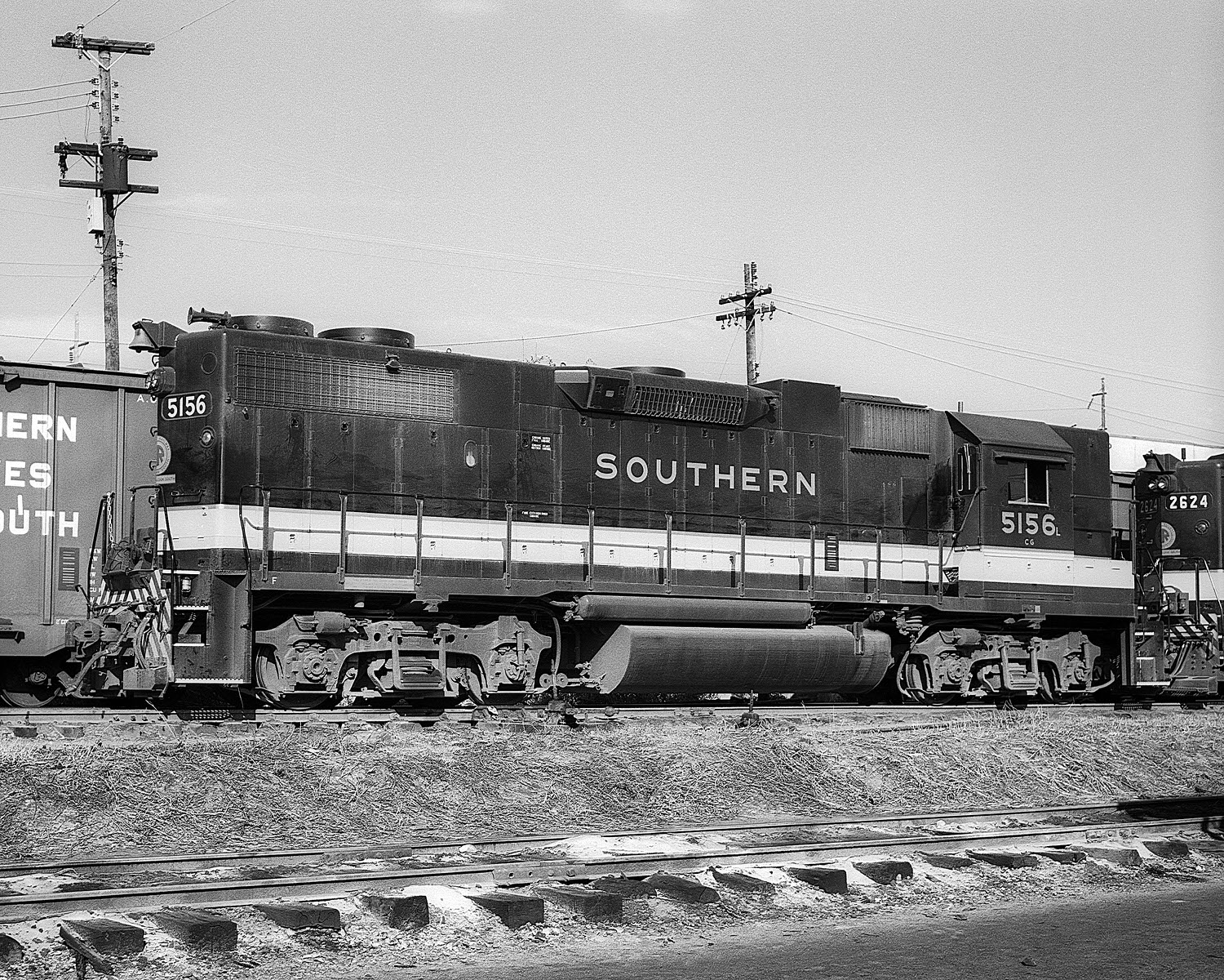 Southern Railway GP38-2 #5156L at Raleigh, NC during March 1975. Ex- AGS, CofG #5156 (8x10) Southern Railway GP38-2 #5156L at Raleigh, NC during March 1975. Ex- AGS, CofG #5156 (8x10)