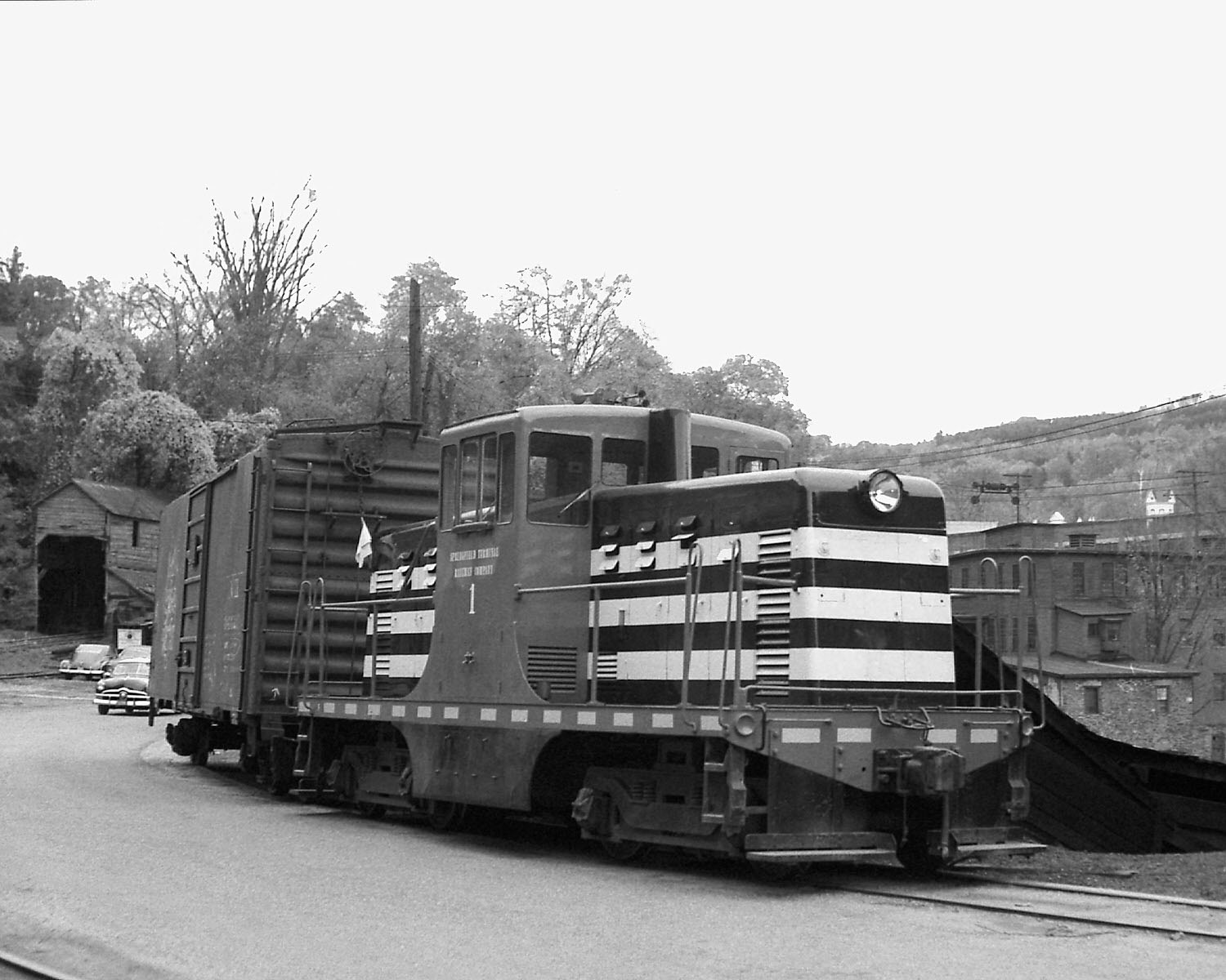 Springfield Terminal 44 tonner #1 switching a boxcar at Springfield, VT in the 1950's (8x10) Springfield Terminal 44 tonner #1 switching a boxcar at Springfield, VT in the 1950's (8x10)